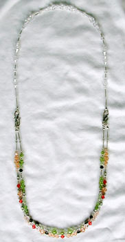 Peach & peridot extended from Crystal