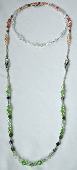 Crystal with Peridot extended from Peach