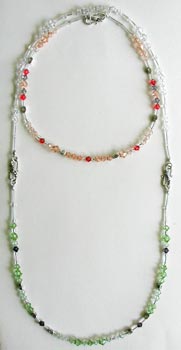 Peach with Peridot extended from Crystal