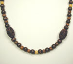 brown carved wood necklace