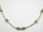 peridot and gold bead necklace