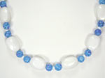 blue lamp glass and white gemstone necklace